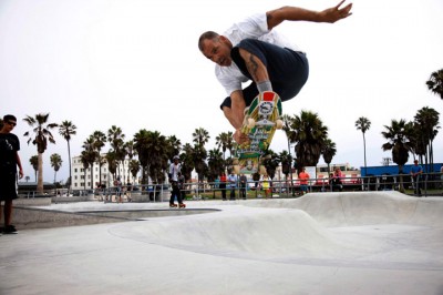 A skater, who frequents Venice Beach, grasps his board mid-air to secure his jump. "Skateboarder at Venice" Second place: Vivian Wong, Stanford University.